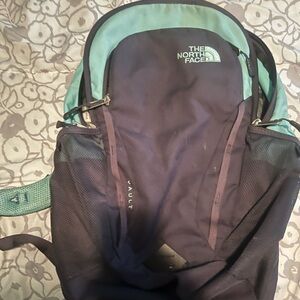 Blue and grey north face backpack
